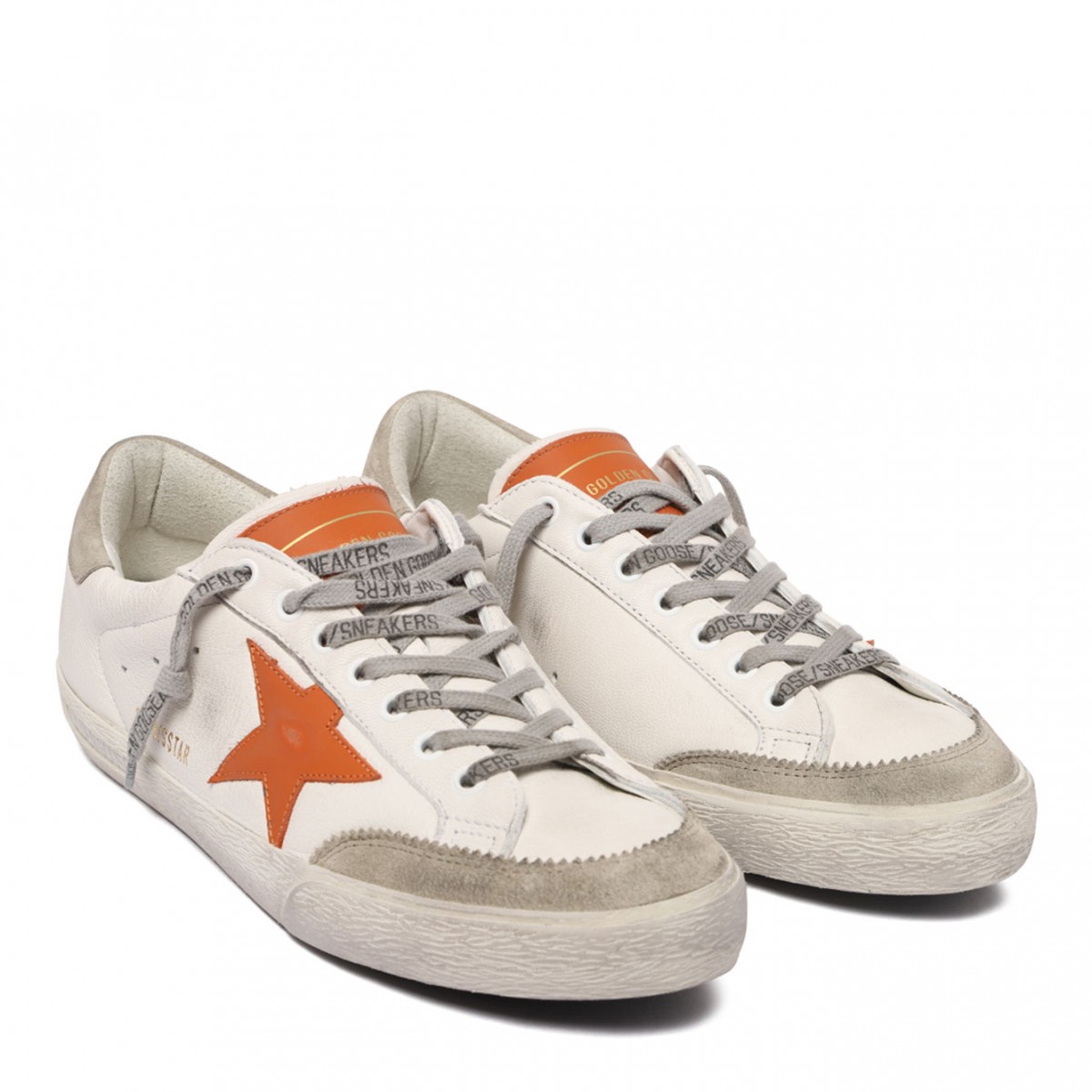 White and Orange Superstar Sneakers