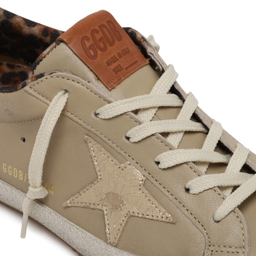 Golden Goose Gold Leather Sneakers.