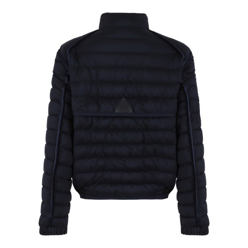 Moncler Navy Quilted Down Jacket with Button Closure. 2