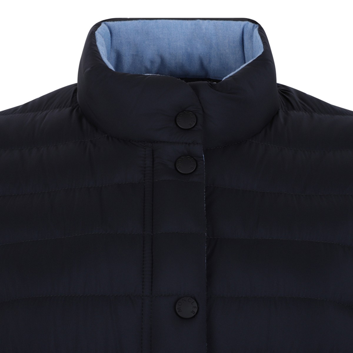 Moncler Navy Quilted Down Jacket with Button Closure.