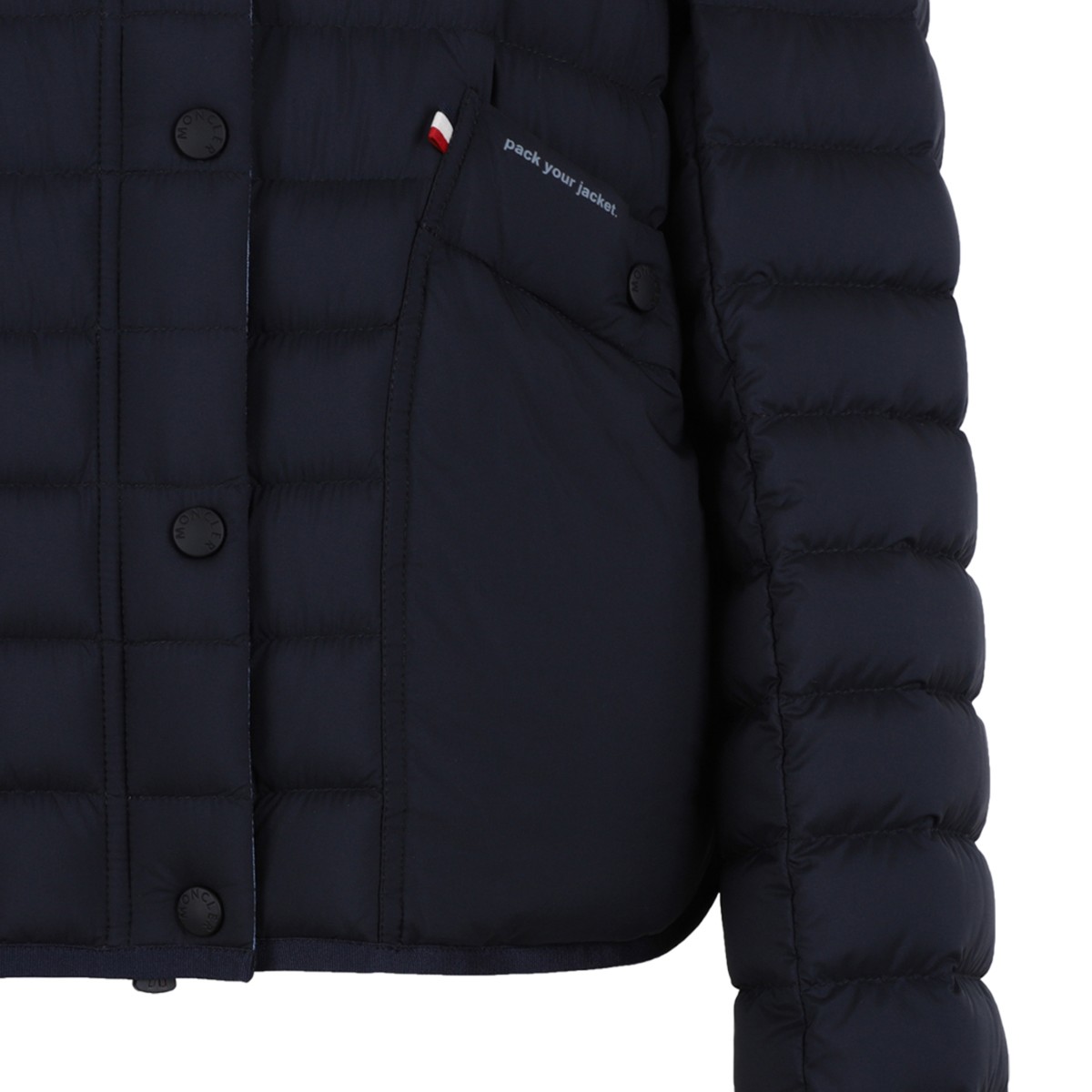 Moncler Navy Quilted Down Jacket with Button Closure.