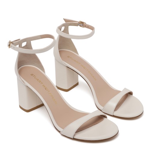 Stuart Weitzman White Leather Ankle-Strap Sandals.