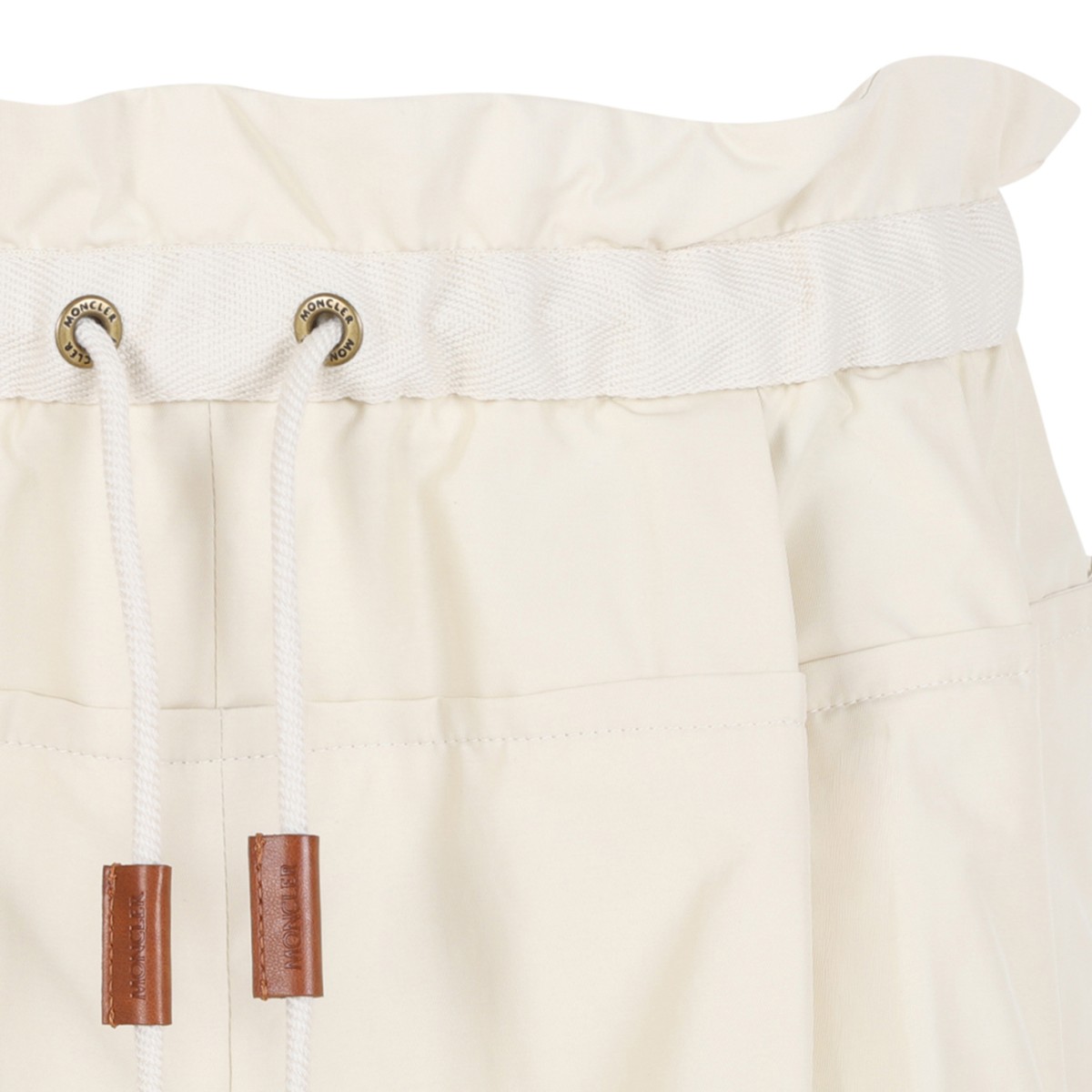 Moncler Cream Drawstring Shorts. 