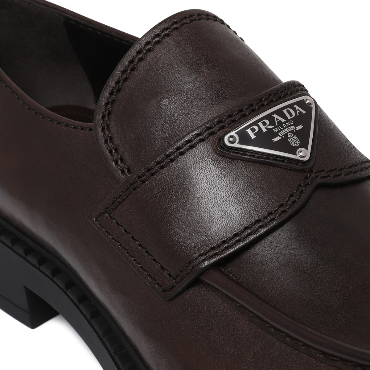 Prada Dark Brown Leather Penny Loafers.