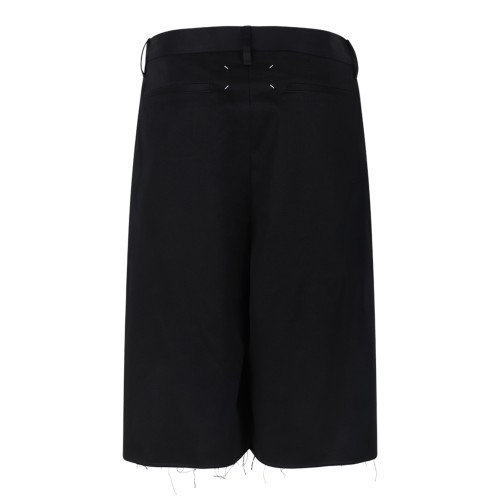 Maison Margiela Black Asymmetric Wrap Skirt. 2