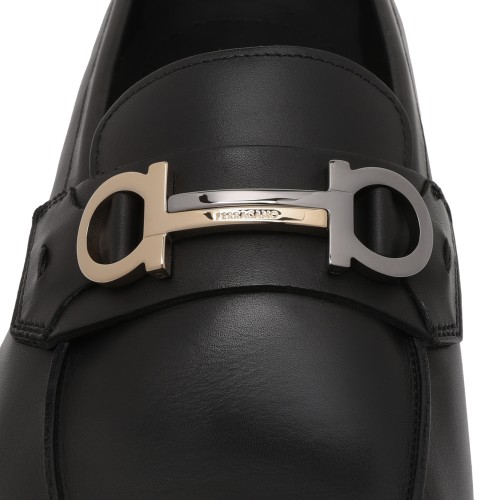 Ferragamo Black Leather Loafers.
