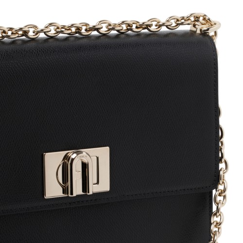 Furla 1927 Black Mini Crossbody, opening with front gold flip lock fastening.