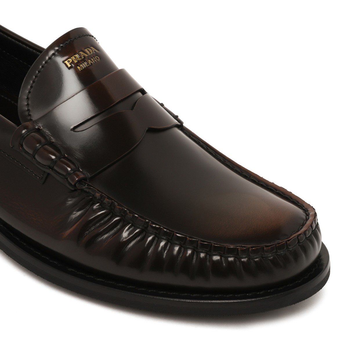 Prada Black Leather Penny Loafers.
