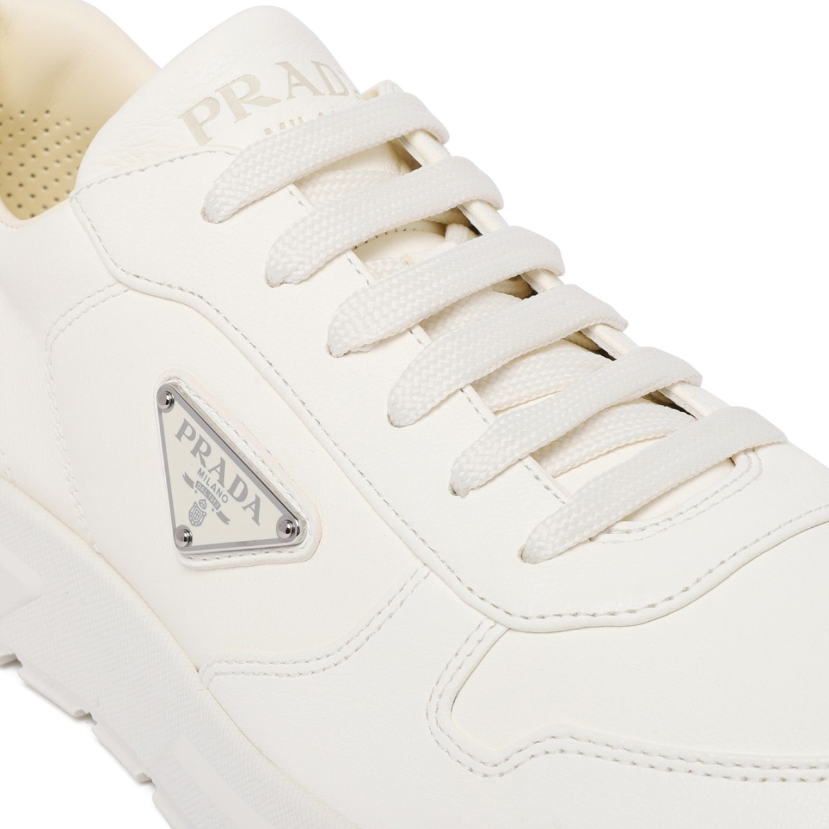 Prada White Leather Sneakers.