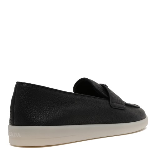 Prada Black Leather Slip-On Loafers.