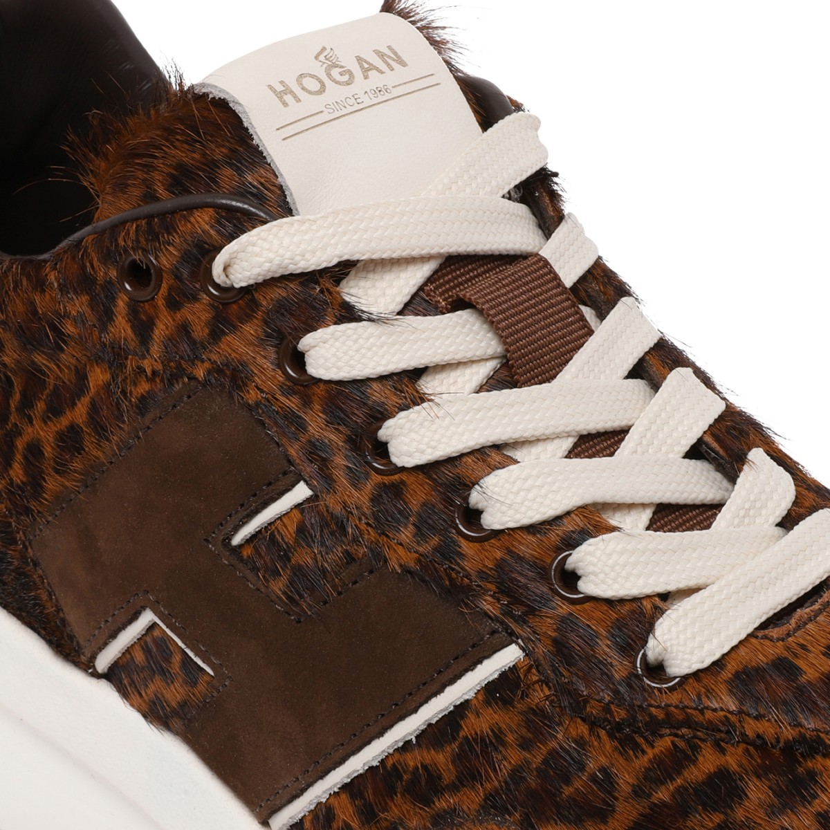 Hogan Leopard-Print Pony Hair Sneakers.