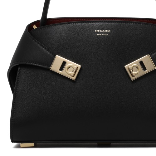 Ferragamo Black Leather Top Handle Bag.