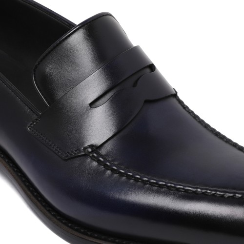 Ferragamo Black Leather Penny Loafers.