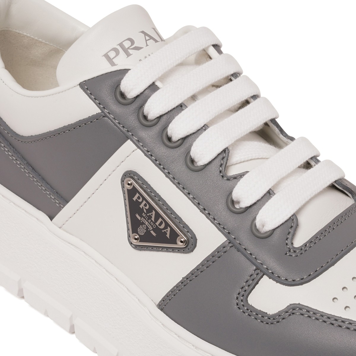 White and Grey Low-Top Sneakers.