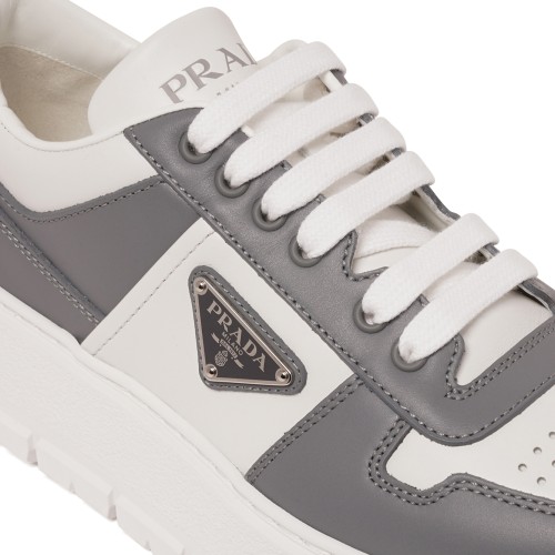 White and Grey Low-Top Sneakers.